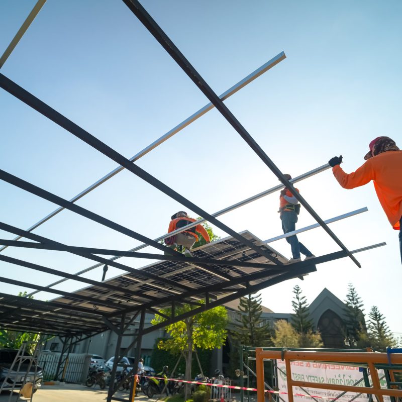 Renewable Energy Eco Technology Electric Power. Worker assemble energy system with solar panel for electricity.(Multiple values)